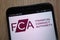 Financial Conduct Authority logo displayed on a modern smartphone