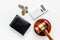 Financial failure, bankruptcy concept. Judge gavel, wallet, coins, calculator on white background top view