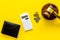 Financial failure, bankruptcy concept. Judge gavel, wallet, coins, calculator on yellow background top view copy space