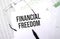 Financial Freedom. Conceptual background with chart ,papers, pen and glasses