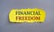 Financial Freedom text on yellow paper. Business photo text Having money Free from worry when it comes to cash flow.Conceptual