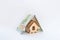 Financial growth concept, real estate tax, buying and selling houses, insurance. A miniature house and a banknote like a roof. Pro