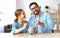 Financial planning happy family couple with piggy Bank