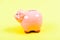 Financial problem. piggy bank on yellow background. income management. money saving. planning budget. Budget limit