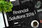 Financial Solutions 2016 on Black Chalkboard. 3D Rendering.