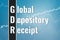 Financial term GDR - Global depository receipt on blue and dark finance background from graphs, charts. Trend Up and Down. 3D