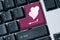 Find love Keyboard pink button with heart shape