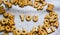 Find you Cookies in the form of the alphabet prospe words from homemade cookies on dark white background