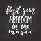 Find your freedom in the music - hand drawn Musical lettering phrase isolated on the black chalkboard background. Fun