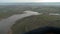 Fine aerial view to lake and field