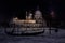 Fine art retro image with gondola on Canal Grande at night with wood planks floor for foreground, full moon and milky, Venice, It