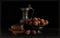 Fine art Still life image of old books and a pewter jug and bowl with walnuts