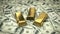 Fine gold bars on USD bills
