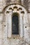 Fine romanesque window in the church of Saint Amand de Coly Fran