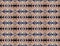 FINE TEXTURED STRAW COLORED PATTERN WITH BLUE BACKGROUND