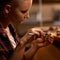 Fine-tuned to perfection. Closeup of a young woman working with tools at a woodwork station.