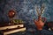 Fineart concept shot. Stilllife with rustic books  with flowers and globe on grey backgrouns