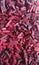 Finely chopped beetroot pieces as a background pattern