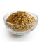 Finely ground ginger in glass bowl.