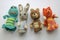 Finger animal puppets knitted from wool. Hand made. Crochet knitting cute teddy bear, frog, hare and fox.