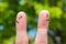 Finger art of couple after argument looking in different directions.