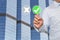 Finger of Businessman touch to green button and white check mark