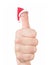 Finger face in Santa hat. Concept for Christmas day.