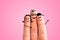 Finger family concept: Joyful finger family smiling. Pink background