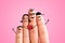 Finger family concept: Joyful finger family smiling. Pink background