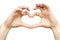 Finger heart of a man wrist isolated love sign on white background