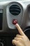 Finger hitting car emergency light botton 1