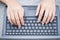 Finger at laptop keyboard. working lifestyle, closeup business woman typing