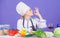 Finger licking good. Pretty woman chef gesturing ok. Kitchen maid preparing vitamin food. Professional cook with vitamin