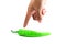 The finger point to the green chili on isolated background