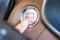 Finger press a car ignition button with 2023 START text inside  automobile. New Year New You, forecast, resolution, motivation,