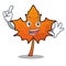 Finger red maple leaf mascot cartoon