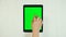A Finger Swipes On a Tablet Green Screen. Double Swipe Down Gesture.