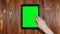 A Finger Swipes On a Tablet Green Screen. Swipe Down Side Gesture.