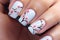 Fingernails with seasonal spring cherry tree flower nail art design