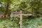A fingerpost sign in Chantry Woods near Guildford, Surrey showing directions for the North Downs Way and public bridleway