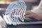 Fingerprint identification. Woman working with laptop at table