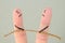 Fingers art of couple. They playing tug of war with rope