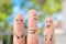 Fingers art of happy family. Concept of child makes face and parents laugh