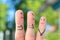 Fingers art of happy family. Concept parents are proud of their child