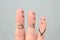 Fingers art of happy family. Concept parents are proud of their child