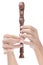Fingers playing soprano flute