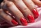 Fingers of a young woman\\\'s hand with beautiful pearlescent nail polish, Creative manicure