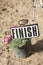 Finish sign with flowers at the finish line