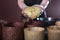 The finished dough for cakes is laid out in forms. Baking cakes for the Easter holiday.An unrecognizable person holds a