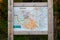 Finland, Ukkohalla - August 1, 2018: wooden information stand with a map of the Ukkohalla ski resort